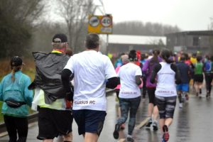 Photo of runners going past the photographer