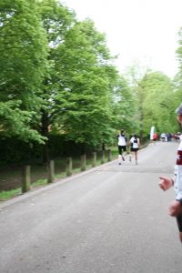 Sara and runner side by side going towards the finish line